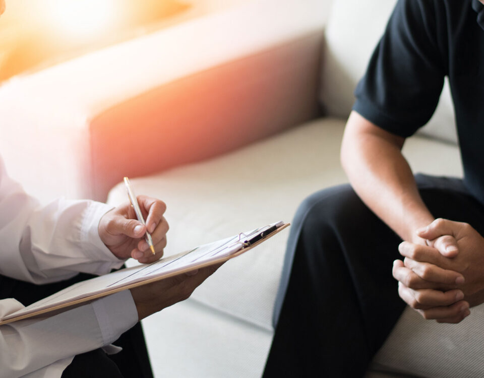 A doctor and patient in the office discussing erectile dysfunction.