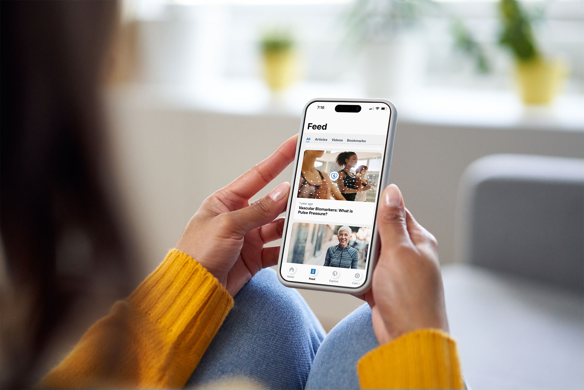 Woman viewing CONNEQT App features
