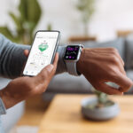 A person checking the heart health numbers for his heart on his app and smartphone. He's wondering if he can trust heart health numbers from his device.