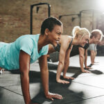 People in a fitness class discussing the rising heart disease risk in young women.