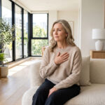 A woman thinking about menopause and heart health.